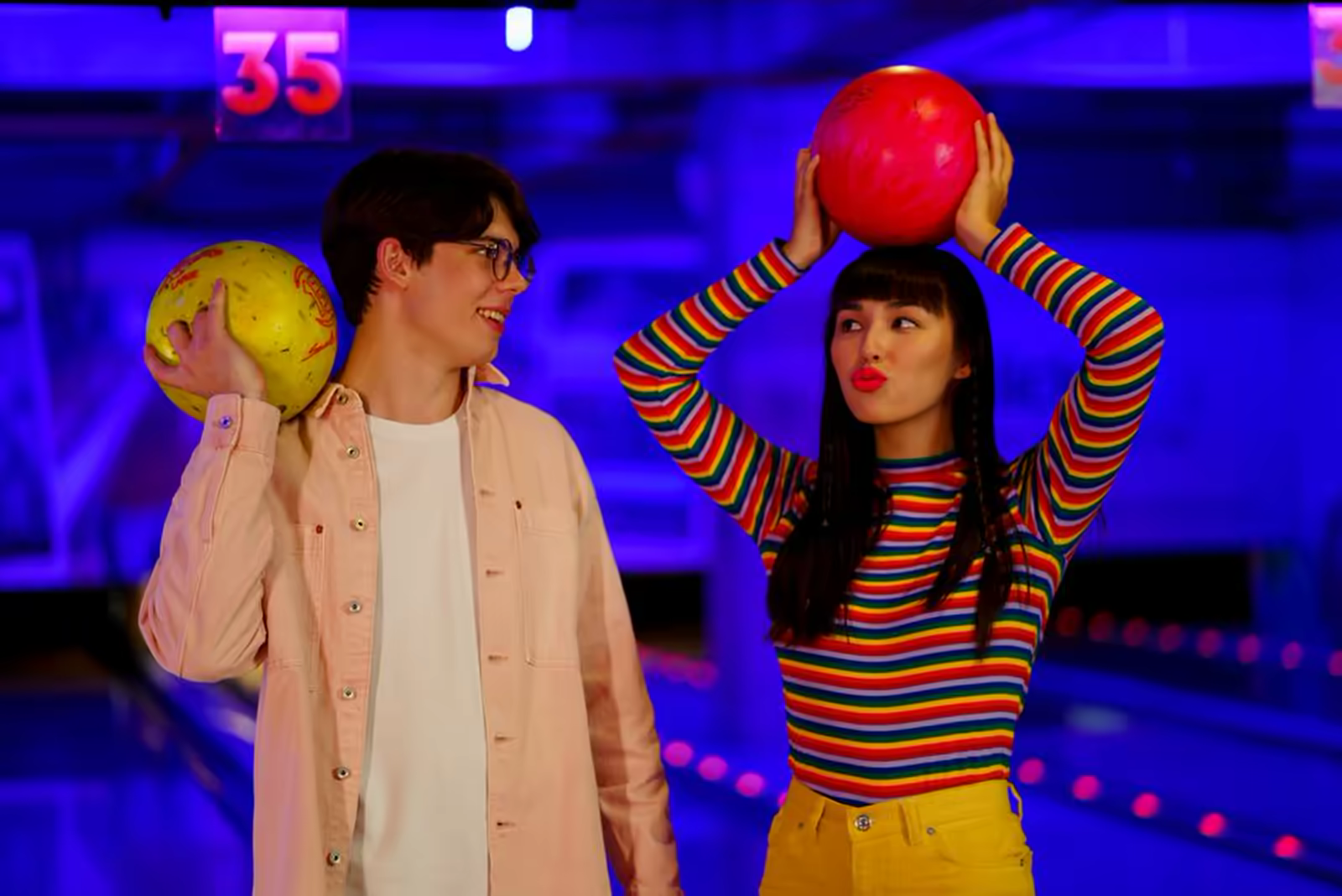 Participants laughing during a ten-pin bowling session