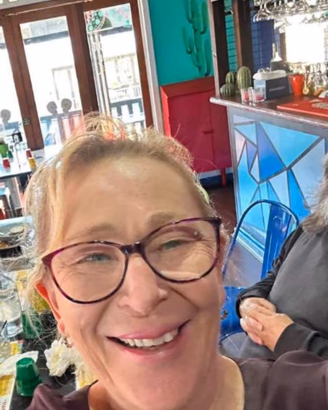 Colleen Barrow, founder and owner of Absolute Disability Services, smiling warmly