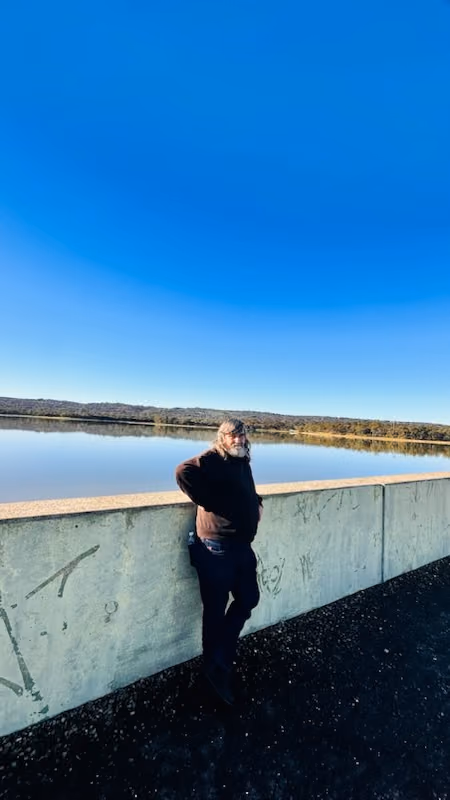 A participant taking in the view at a reservoir.
