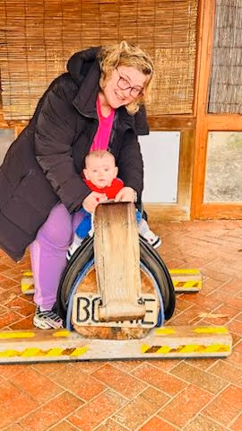 A support worker and child enjoying playtime.